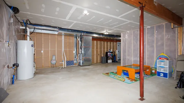 a view of a house with backyard sitting area and garden
