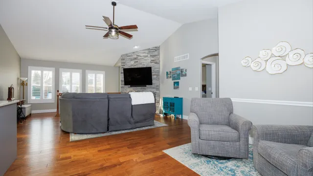 a kitchen with sink a stove and cabinets