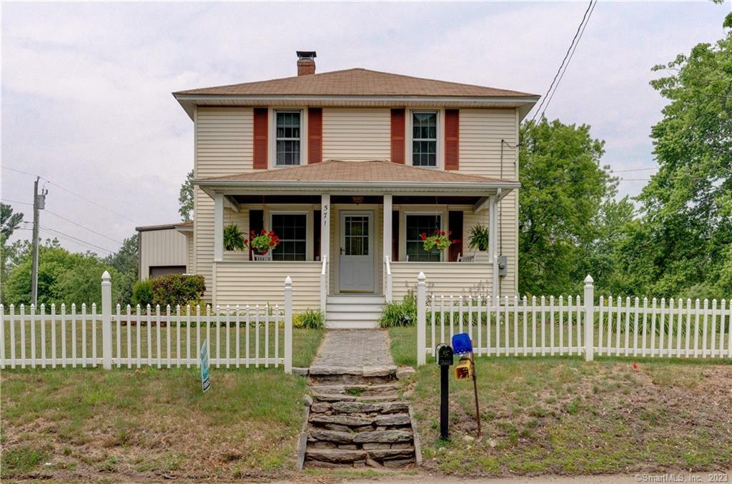 571 North Windham Road Windham, CT 06256 - Photo 1 of 1 a front view of a house with a fence