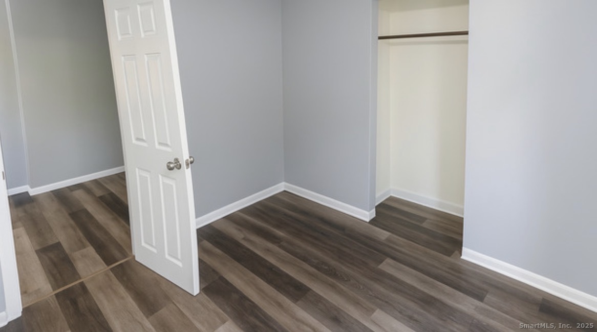 64 McKinley Avenue, Unit A9 Bridgeport, CT 06606 - Photo 1 of 1 a view of wooden floor