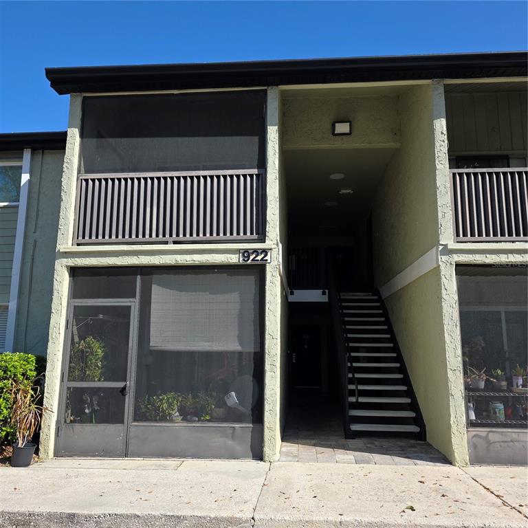 a view of a balcony with door