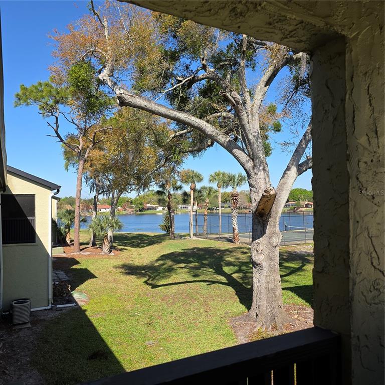 922 Lake Destiny Road, Unit F Altamonte Springs, FL 32714 - Photo 16 of 17 a view of swimming pool with a yard