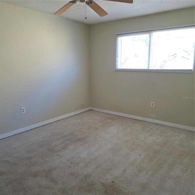 922 Lake Destiny Road, Unit F Altamonte Springs, FL 32714 - Photo 6 of 17 an empty room with a window