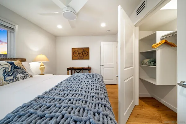 a view of a hallway with washer and dryer