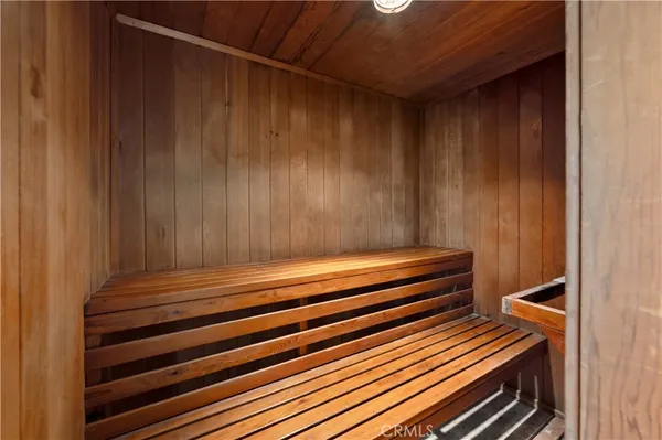 a sitting area with wooden floors