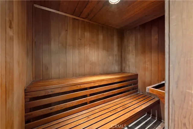 a sitting area with wooden floors