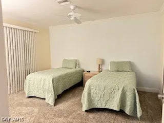 a bedroom with a bed and a night stand