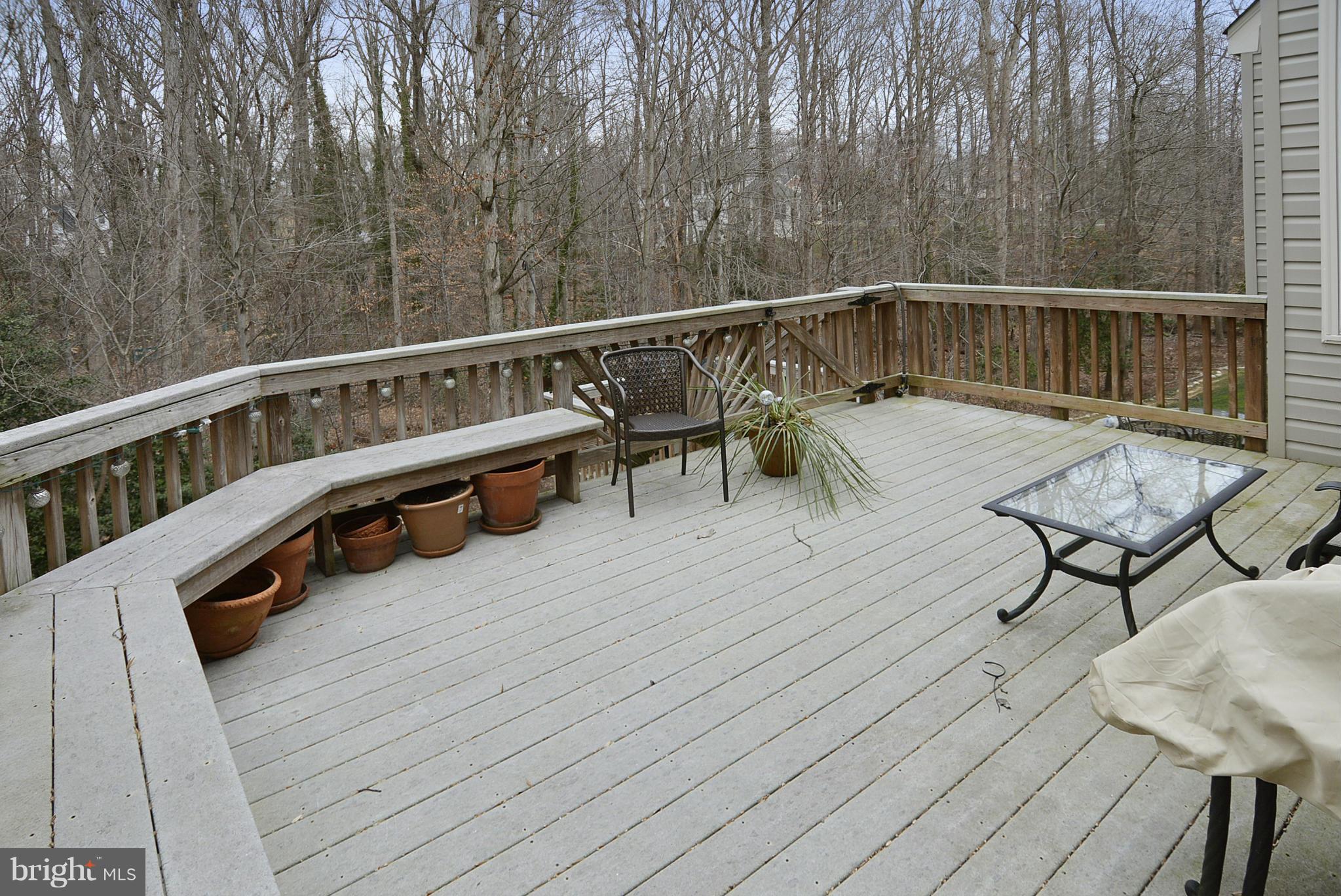 7406 Spring Summit Road Springfield, VA 22150 - Photo 27 of 30 a view of a balcony with chairs