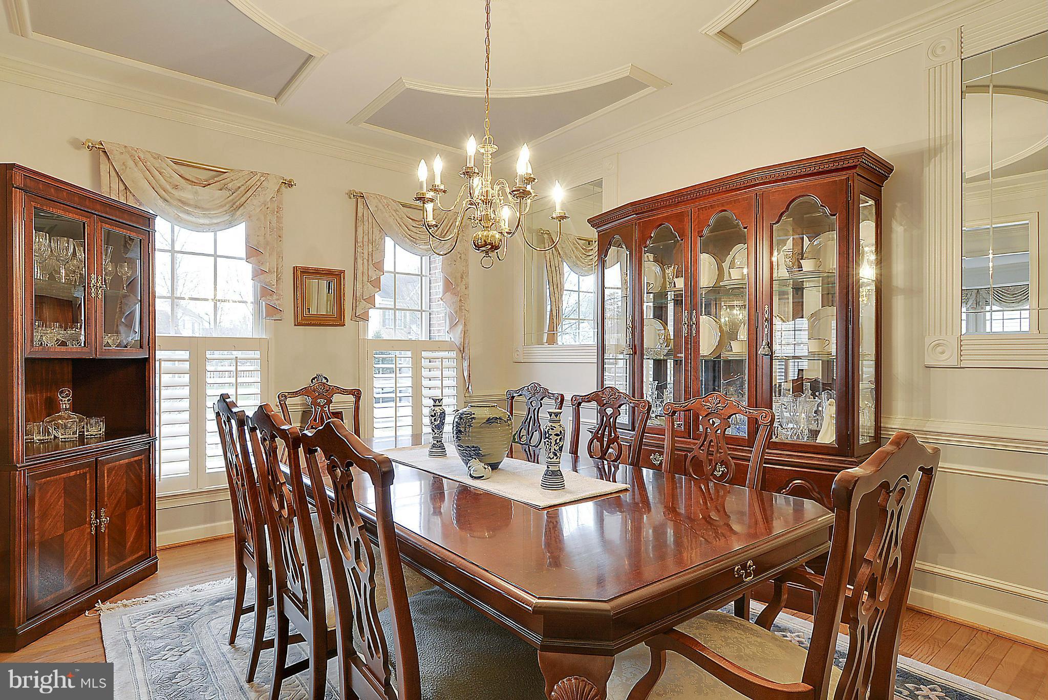 7406 Spring Summit Road Springfield, VA 22150 - Photo 7 of 30 a view of a dining room with furniture window and outside view