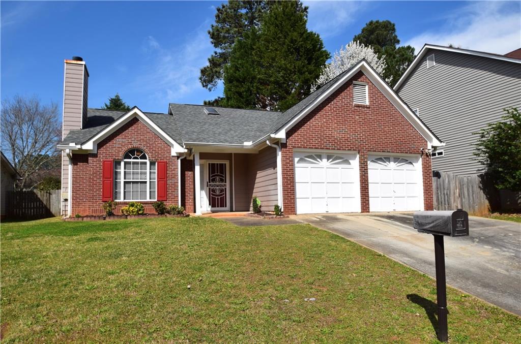 3753 Landgraf Cove Decatur, GA 30034 - Photo 1 of 1 a front view of a house with a yard