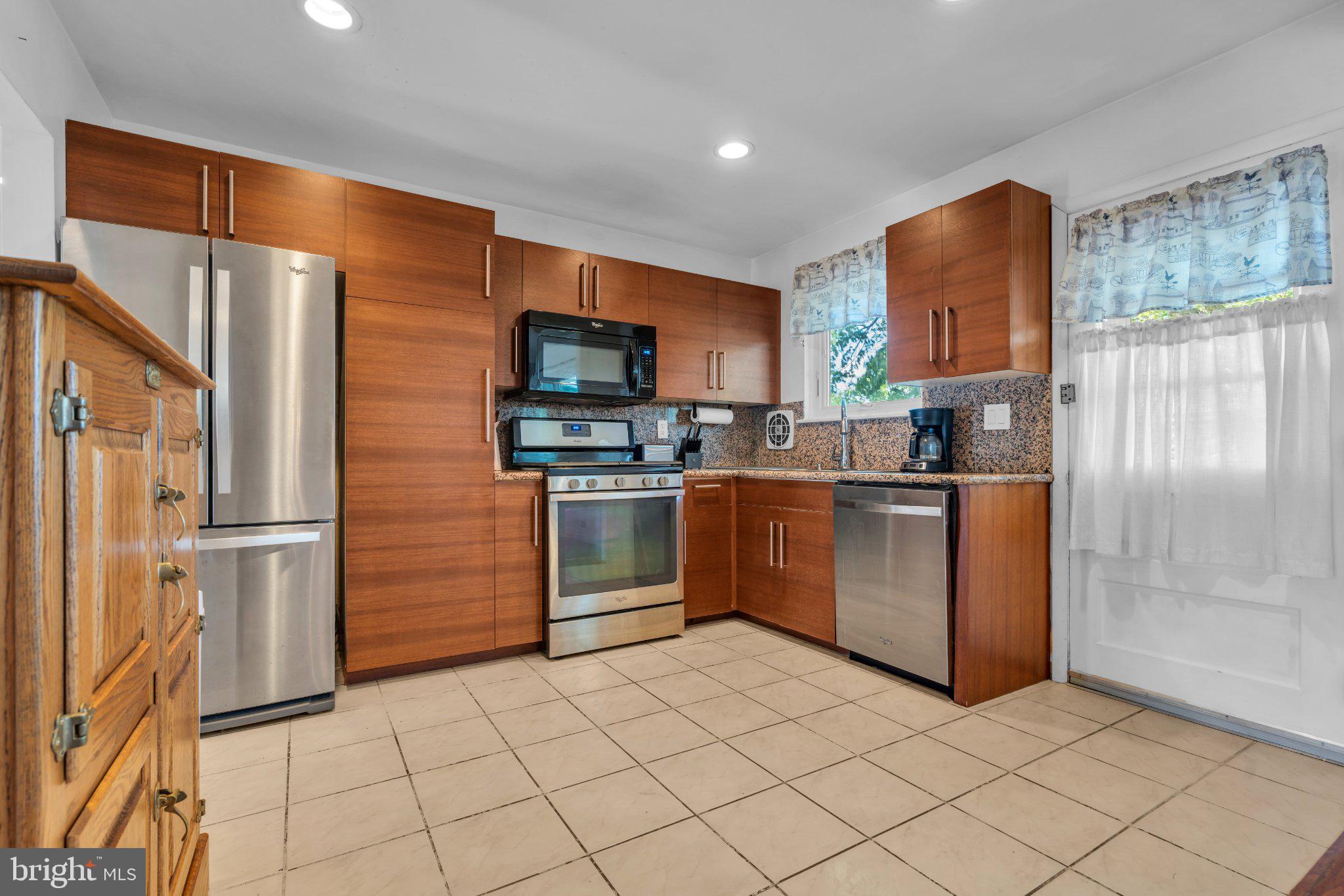 34 Haines Mill Road Delran, NJ 08075 - Photo 9 of 34 Modern kitchen with warm wood tones.