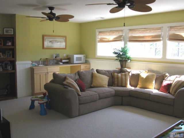 3320 La Costa Way Raleigh, NC 27610 - Photo 8 of 10 a living room with furniture and a large window