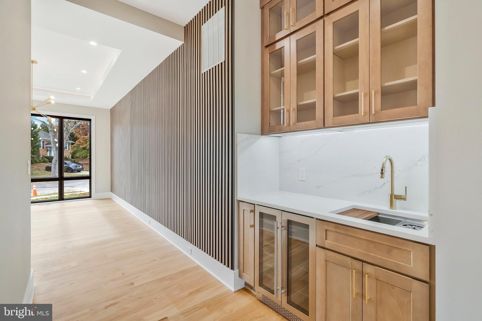 1907 Foxhall Road McLean, VA 22101 - Photo 17 of 100 Butler’s pantry with Zephyr
beverage cooler