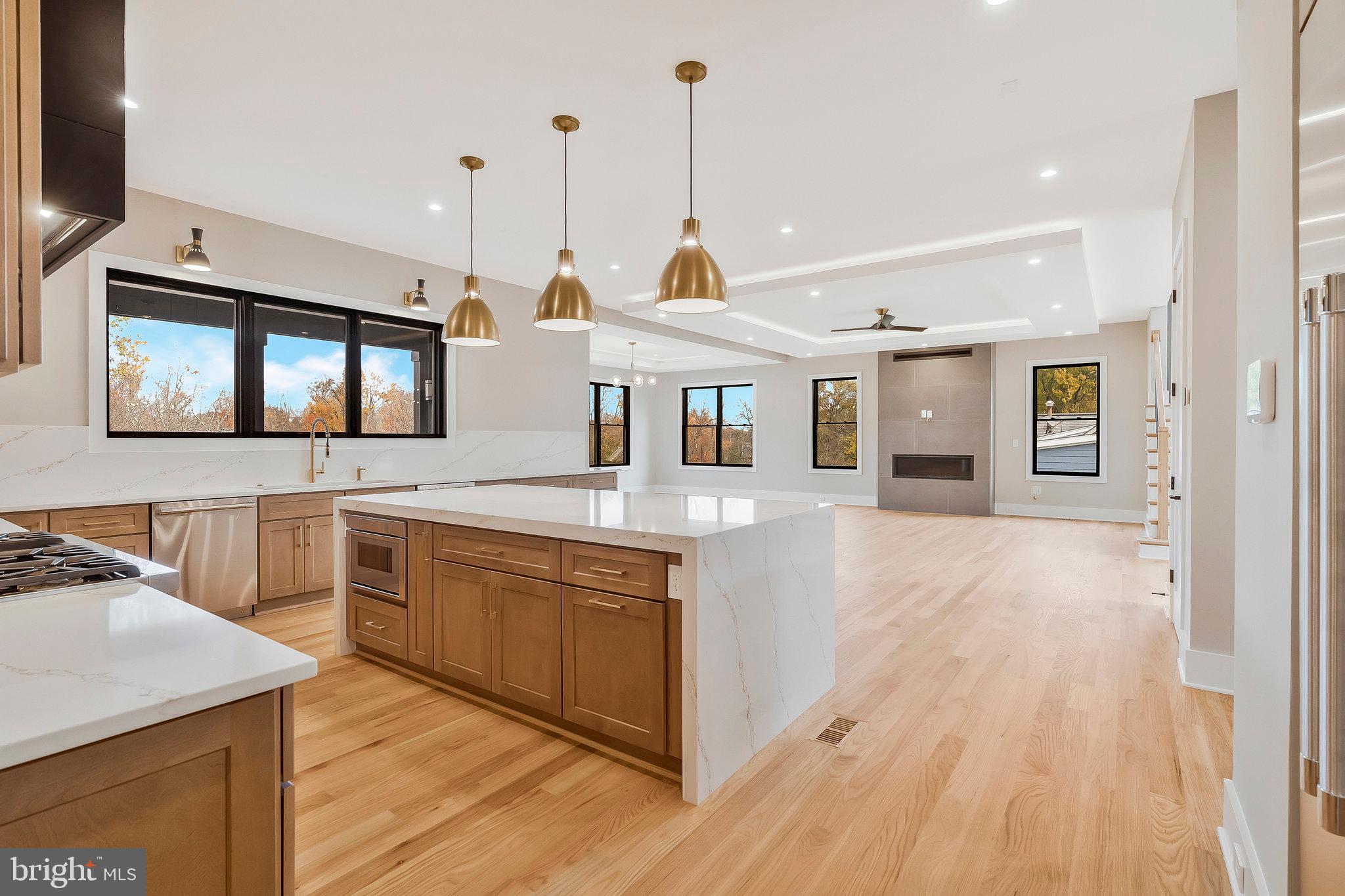 1907 Foxhall Road McLean, VA 22101 - Photo 21 of 100 3 pendant lights over kitchen island