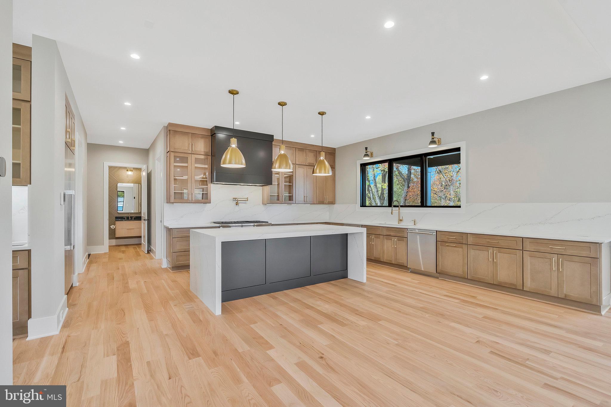 1907 Foxhall Road McLean, VA 22101 - Photo 23 of 100 3 pendant lights over kitchen island