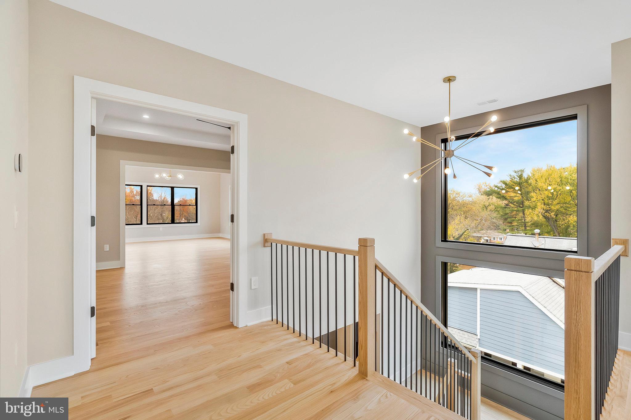1907 Foxhall Road McLean, VA 22101 - Photo 31 of 100 Elegant chandelier above the stairs