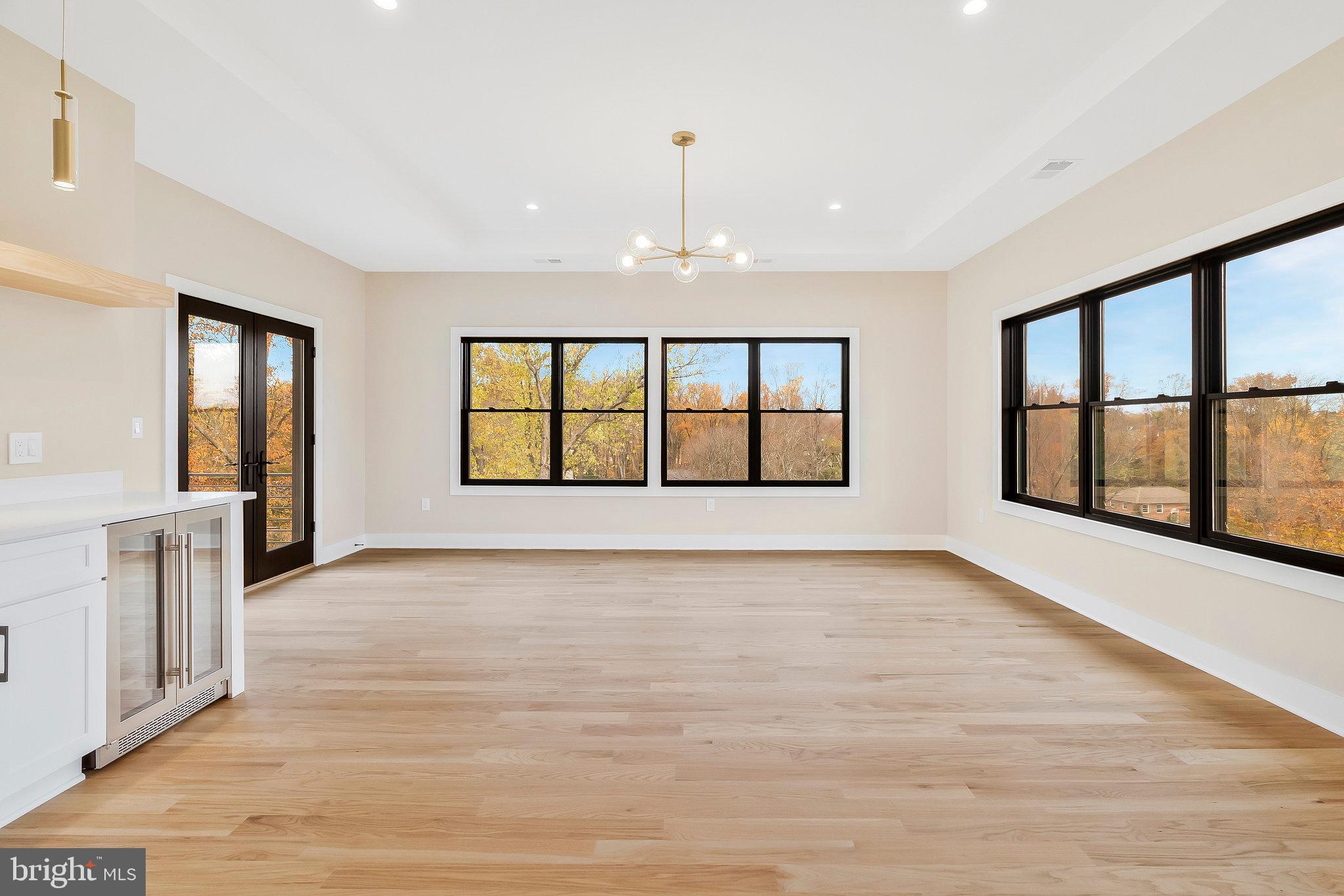 1907 Foxhall Road McLean, VA 22101 - Photo 37 of 100 Box ceiling with LED recessed lights and a fan