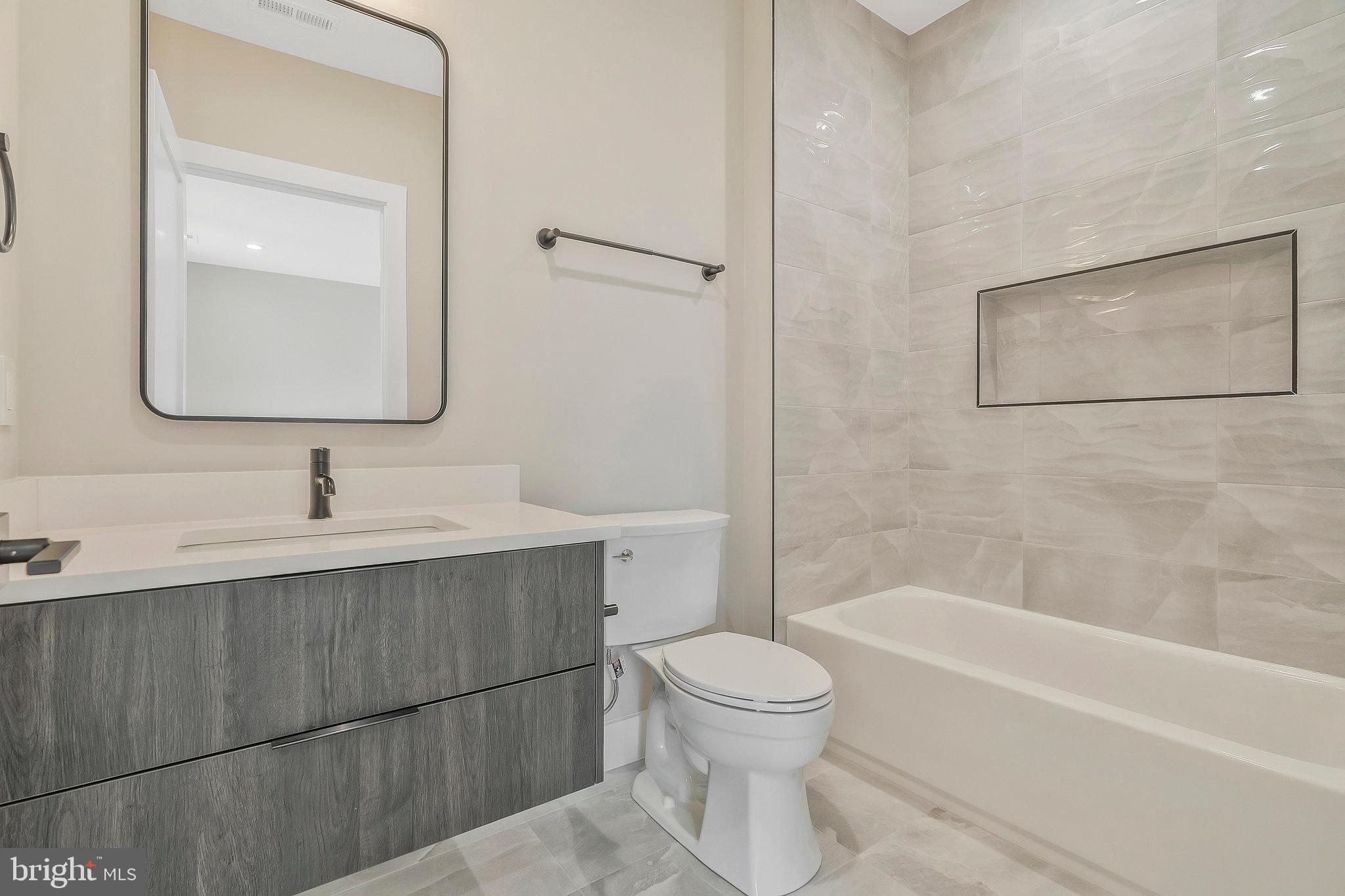 1907 Foxhall Road McLean, VA 22101 - Photo 55 of 100 Bedroom with full bathroom and walk-in closet