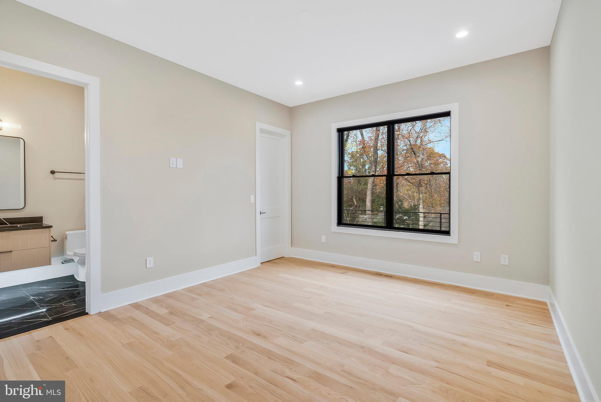 1907 Foxhall Road McLean, VA 22101 - Photo 61 of 100 Bedroom with full bathroom and walk-in closet