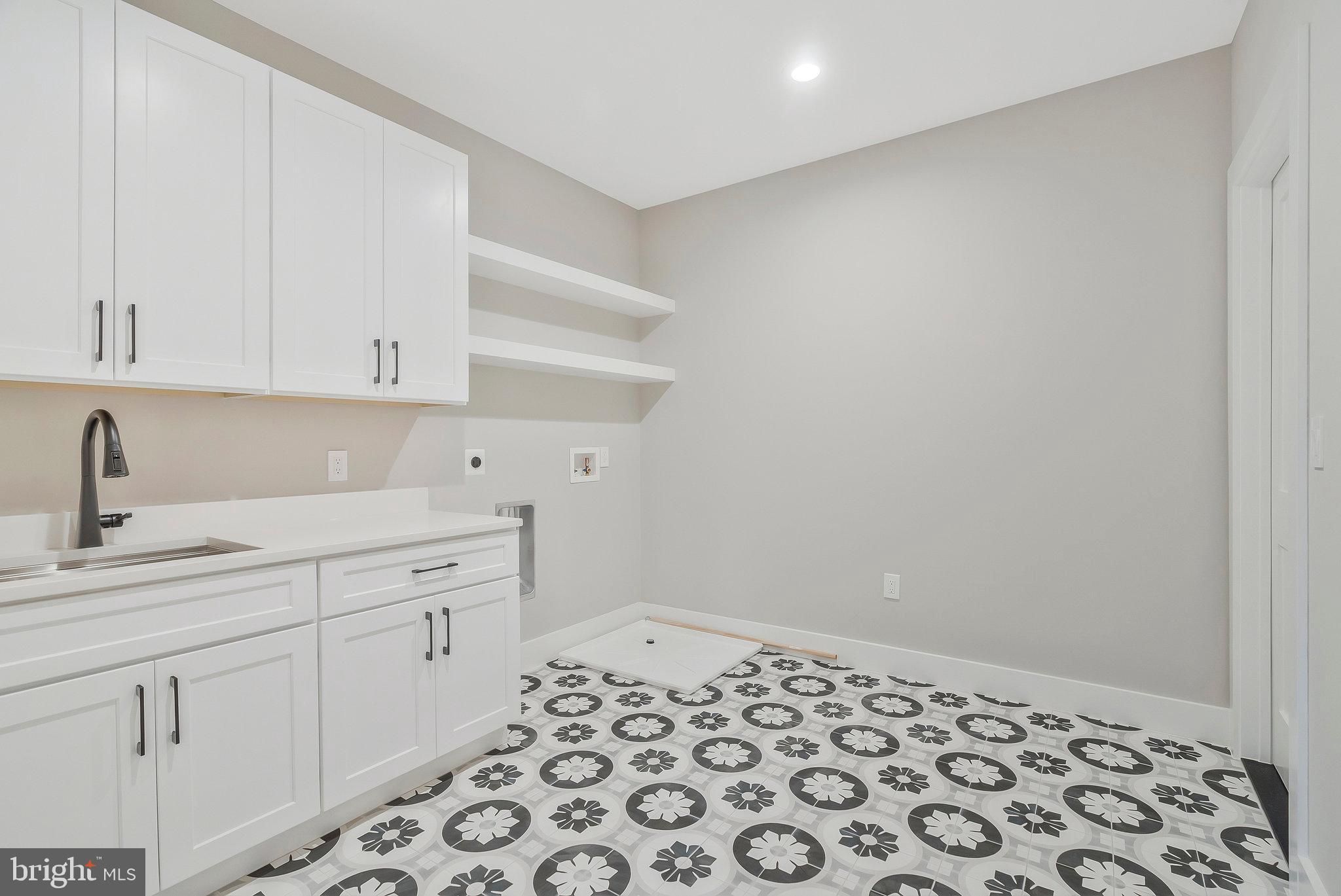 1907 Foxhall Road McLean, VA 22101 - Photo 74 of 100 Ceramic tile flooring at laundry room