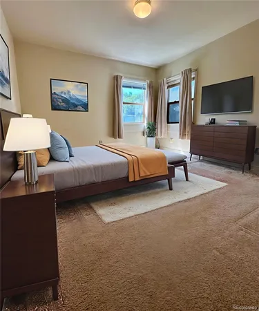 a bathroom with a shower and a sink