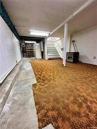 a view of a hallway with a livingroom