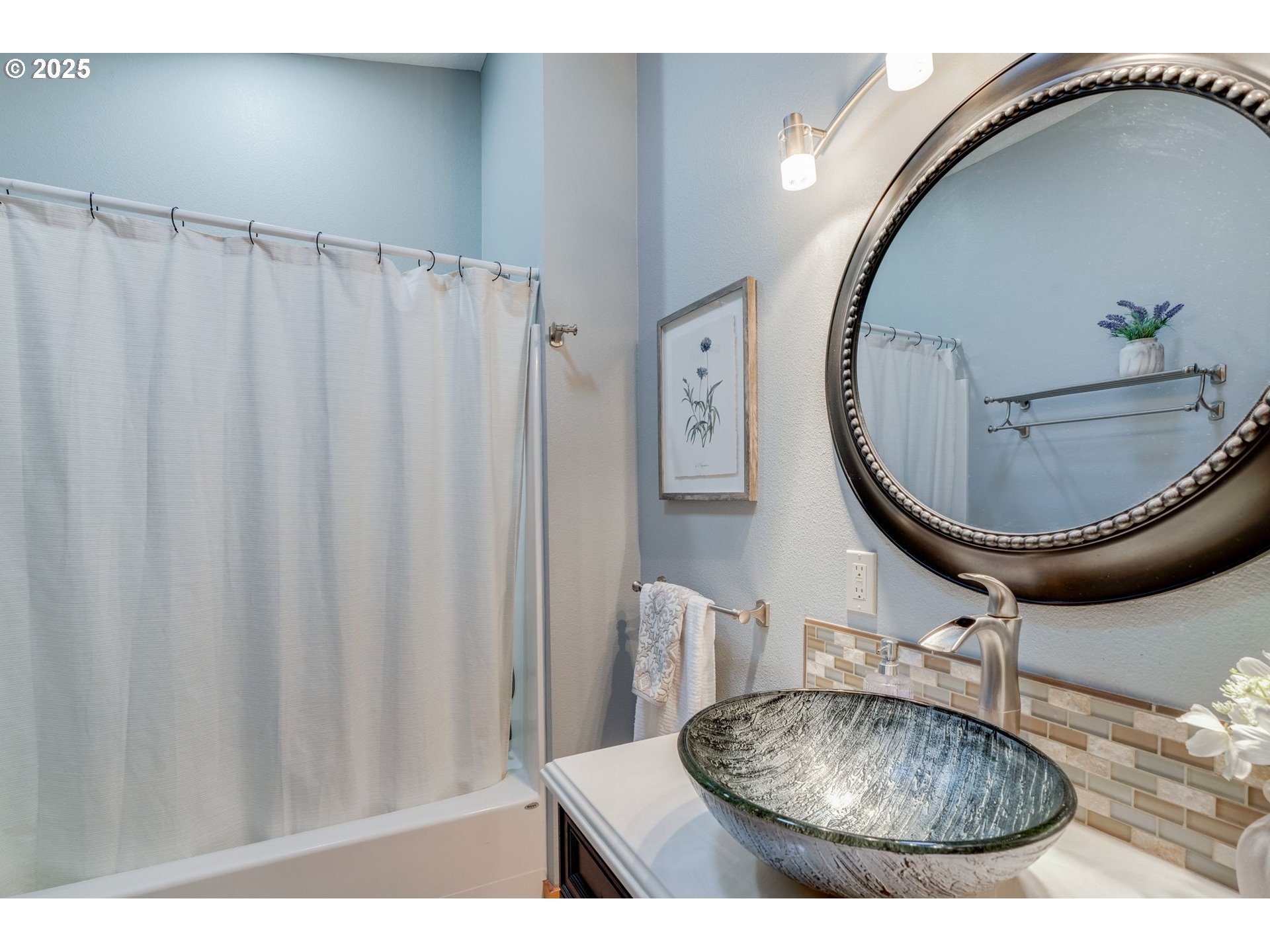30076 Southeast Cemetery Road Estacada, OR 97023 - Photo 16 of 38 a bathroom with a sink a mirror and a rug