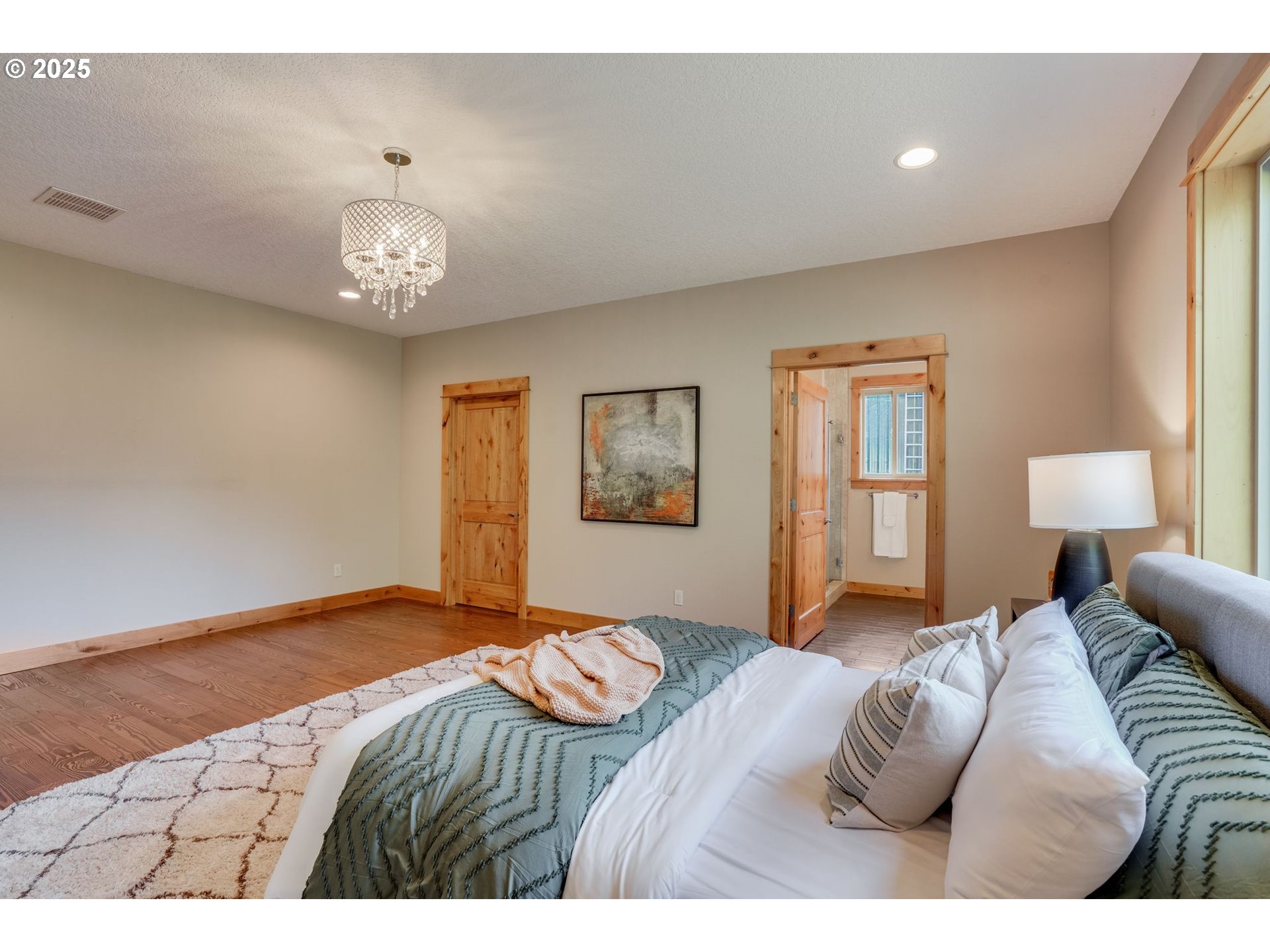30076 Southeast Cemetery Road Estacada, OR 97023 - Photo 21 of 38 a bedroom with a large bed and a window