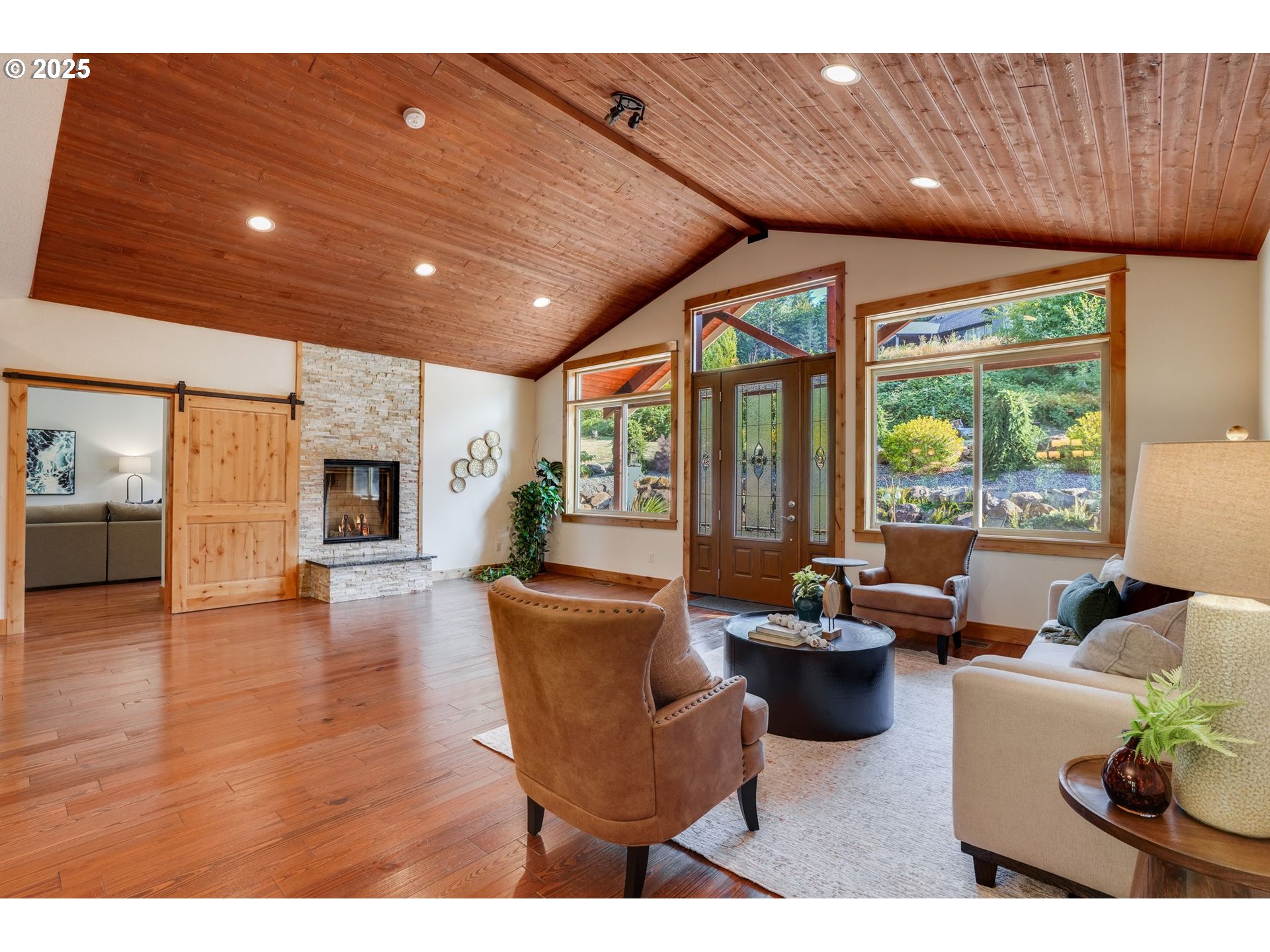 30076 Southeast Cemetery Road Estacada, OR 97023 - Photo 5 of 38 a living room with furniture and a fireplace