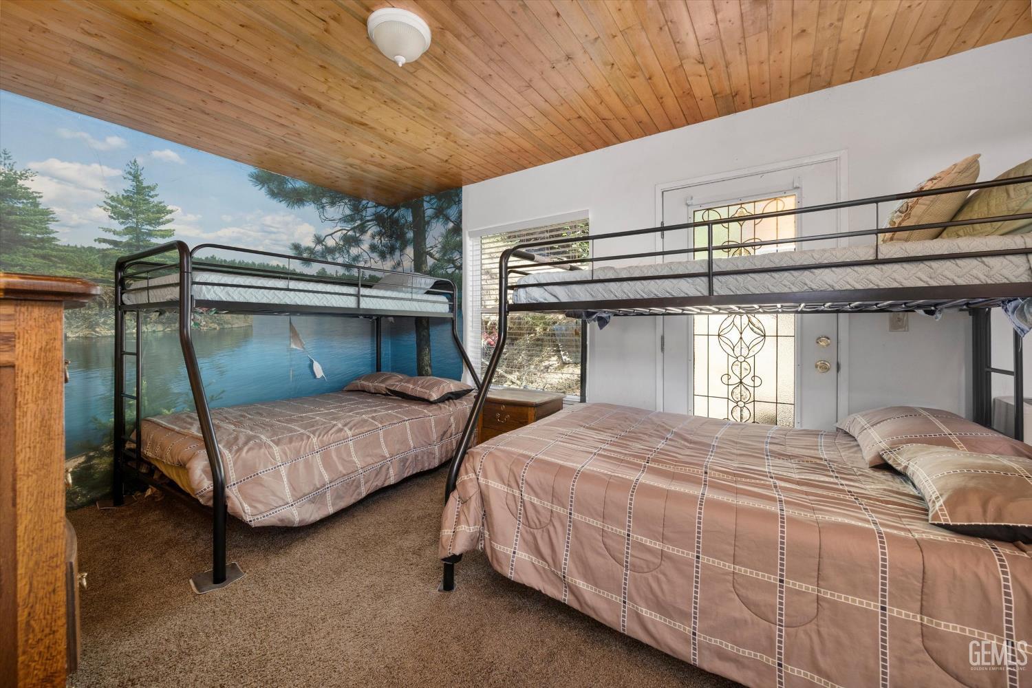 Undisclosed Address Posey, CA 93260 - Photo 12 of 28 a bedroom with two beds and window