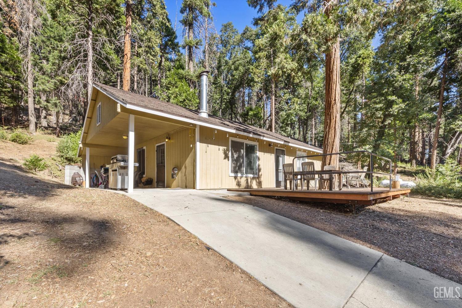 Undisclosed Address Posey, CA 93260 - Photo 2 of 28 a view of a house with large windows