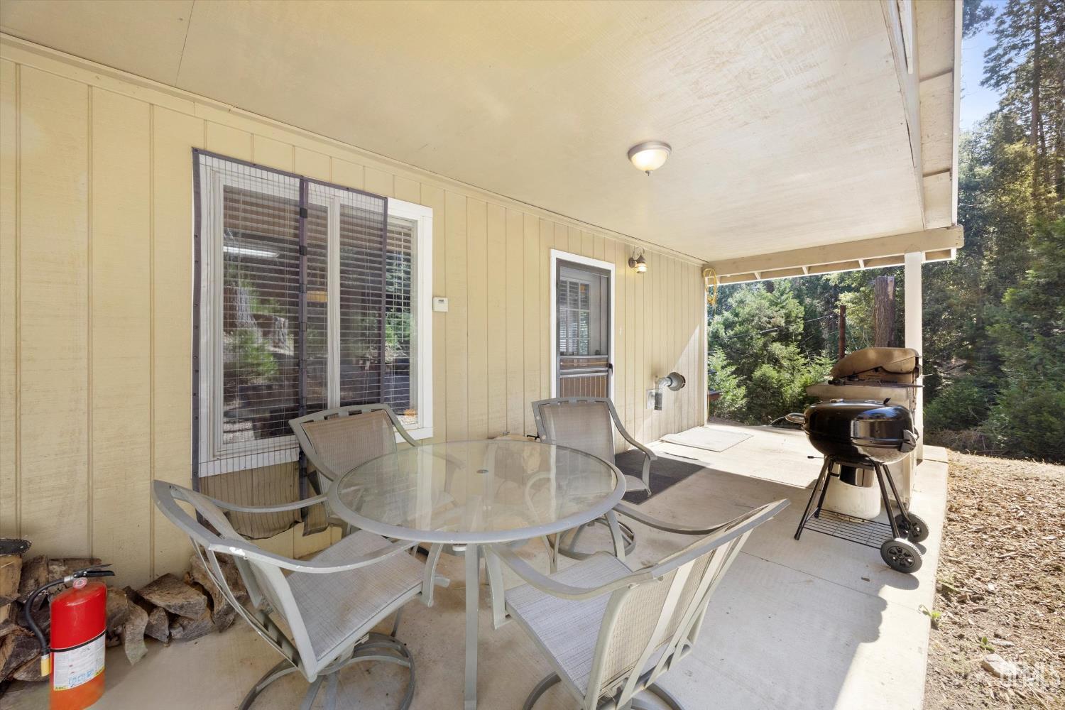 Undisclosed Address Posey, CA 93260 - Photo 22 of 28 a living room with furniture and a potted plant