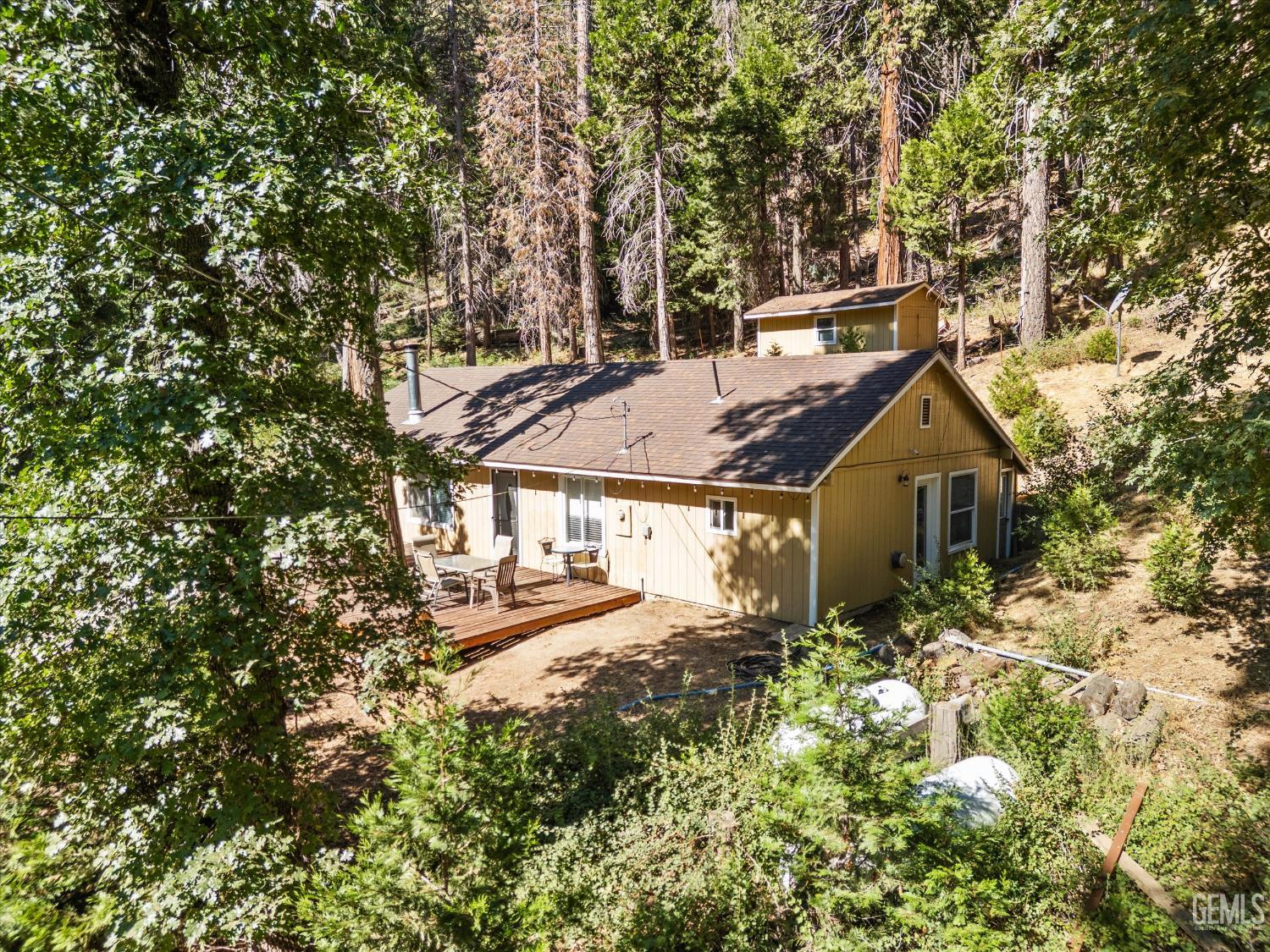 Undisclosed Address Posey, CA 93260 - Photo 26 of 28 front view of a house with a yard