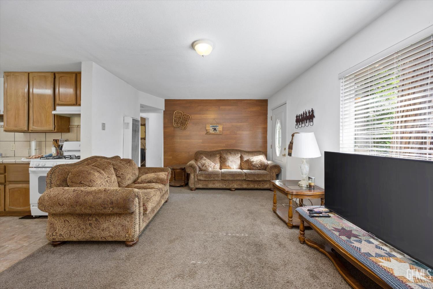 Undisclosed Address Posey, CA 93260 - Photo 6 of 28 a living room with furniture and a flat screen tv