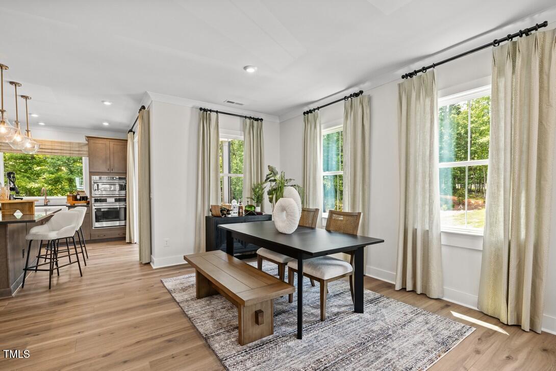 4734 Cypress Tree Lane Raleigh, NC 27612 - Photo 5 of 37 Elm Park 48_Dining Room 1_6.24.24_webrea