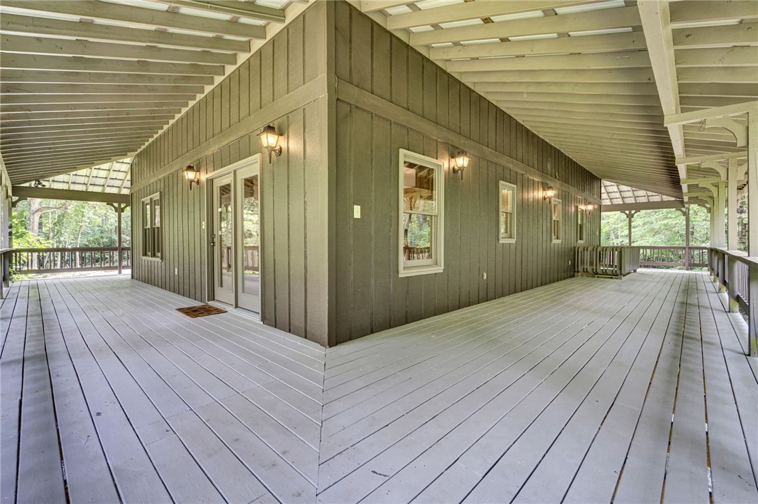 120 Patterson Ridge Road Salem, SC 29676 - Photo 31 of 46 An inviting covered deck offers ample space for outdoor living and tranquil views.