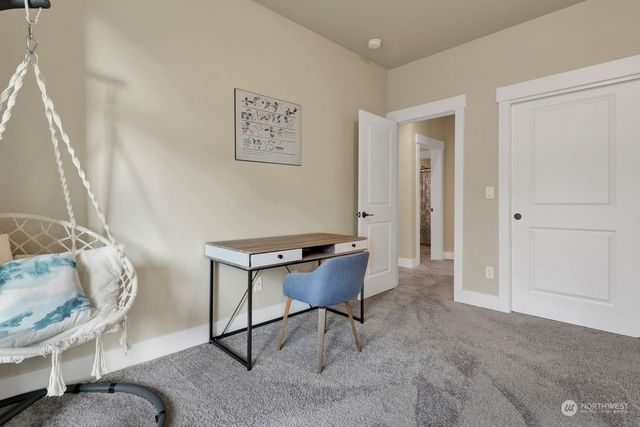 a room with furniture and a window