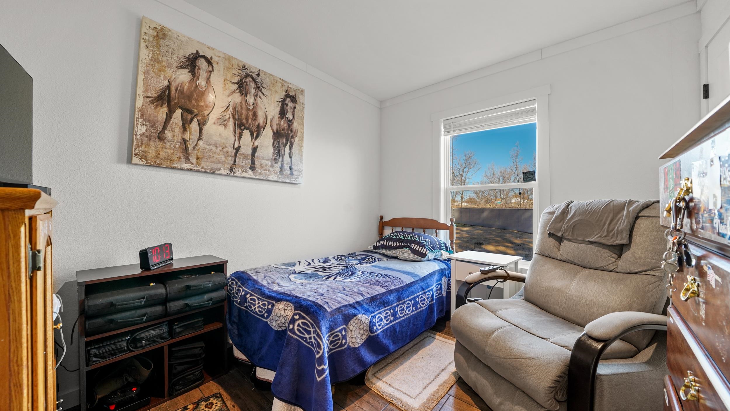 1296 M M 1/4 Road Loma, CO 81524 - Photo 20 of 30 a living room with furniture and a piano
