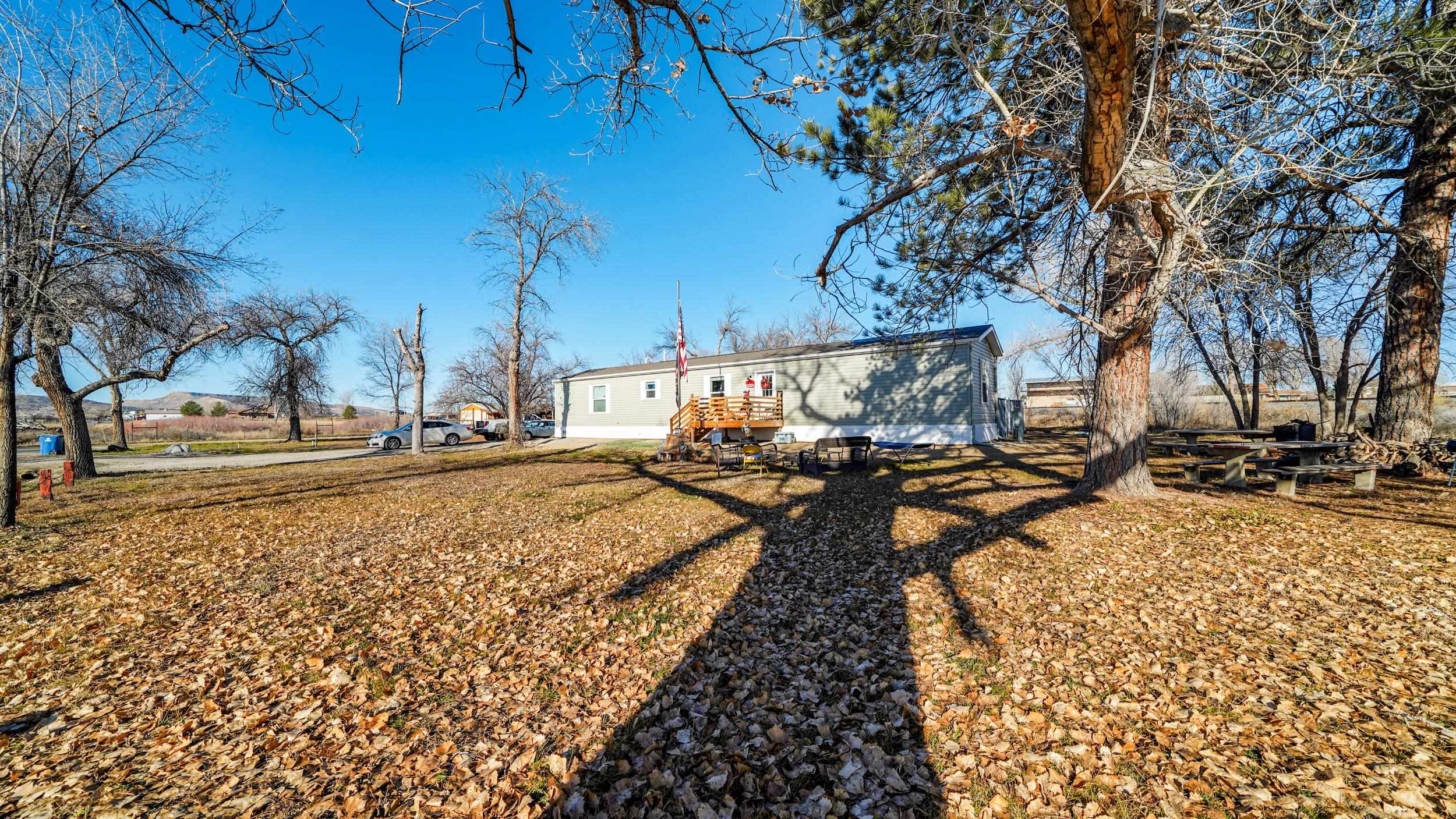 1296 M M 1/4 Road Loma, CO 81524 - Photo 23 of 30 a view of a backyard of the house