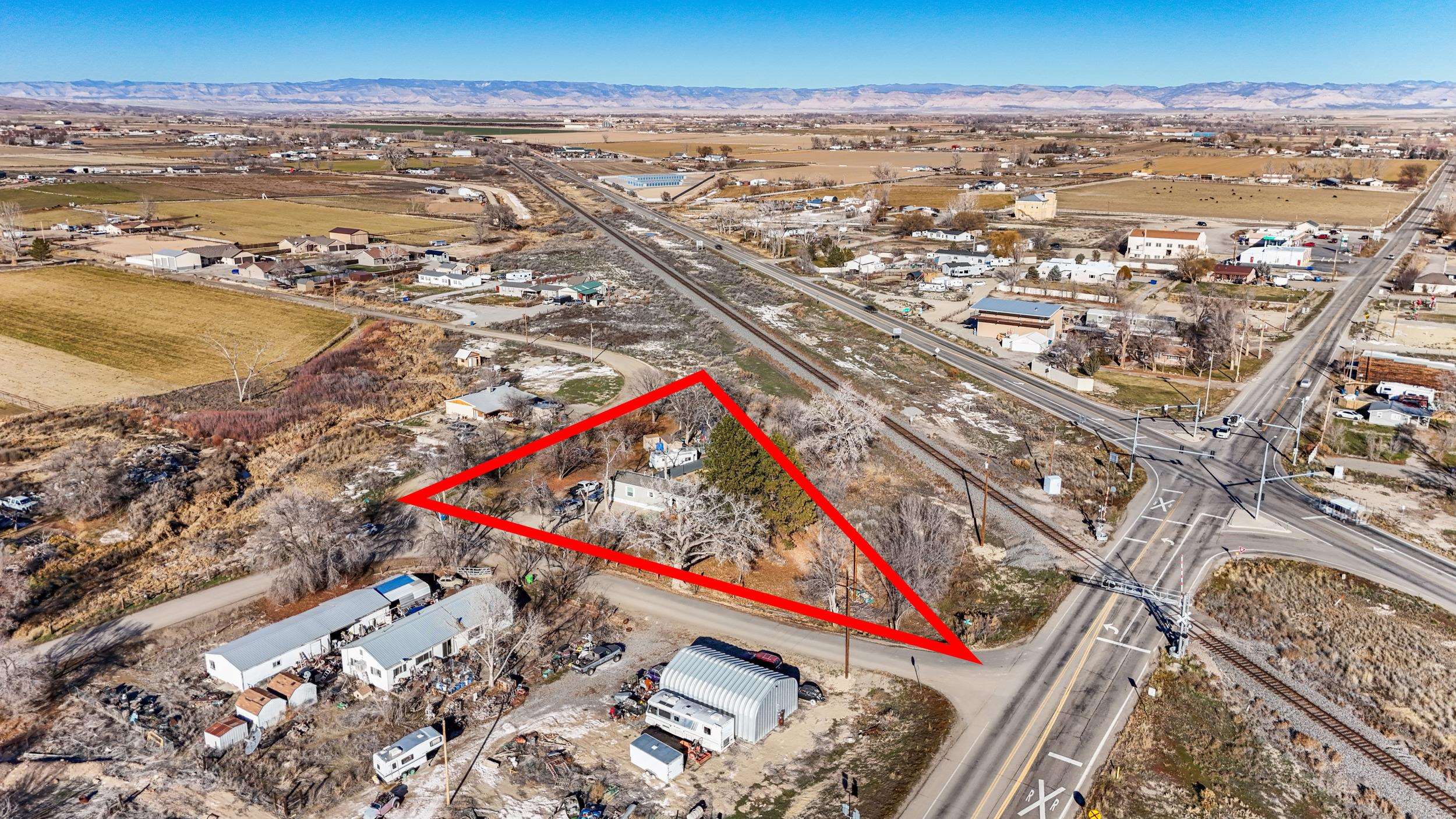 1296 M M 1/4 Road Loma, CO 81524 - Photo 27 of 30 an aerial view of beach and city