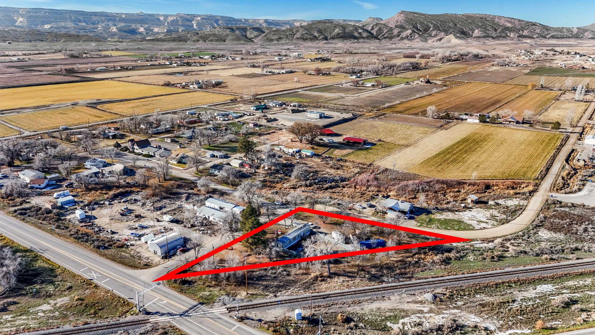 1296 M M 1/4 Road Loma, CO 81524 - Photo 29 of 30 an aerial view of residential houses with outdoor space