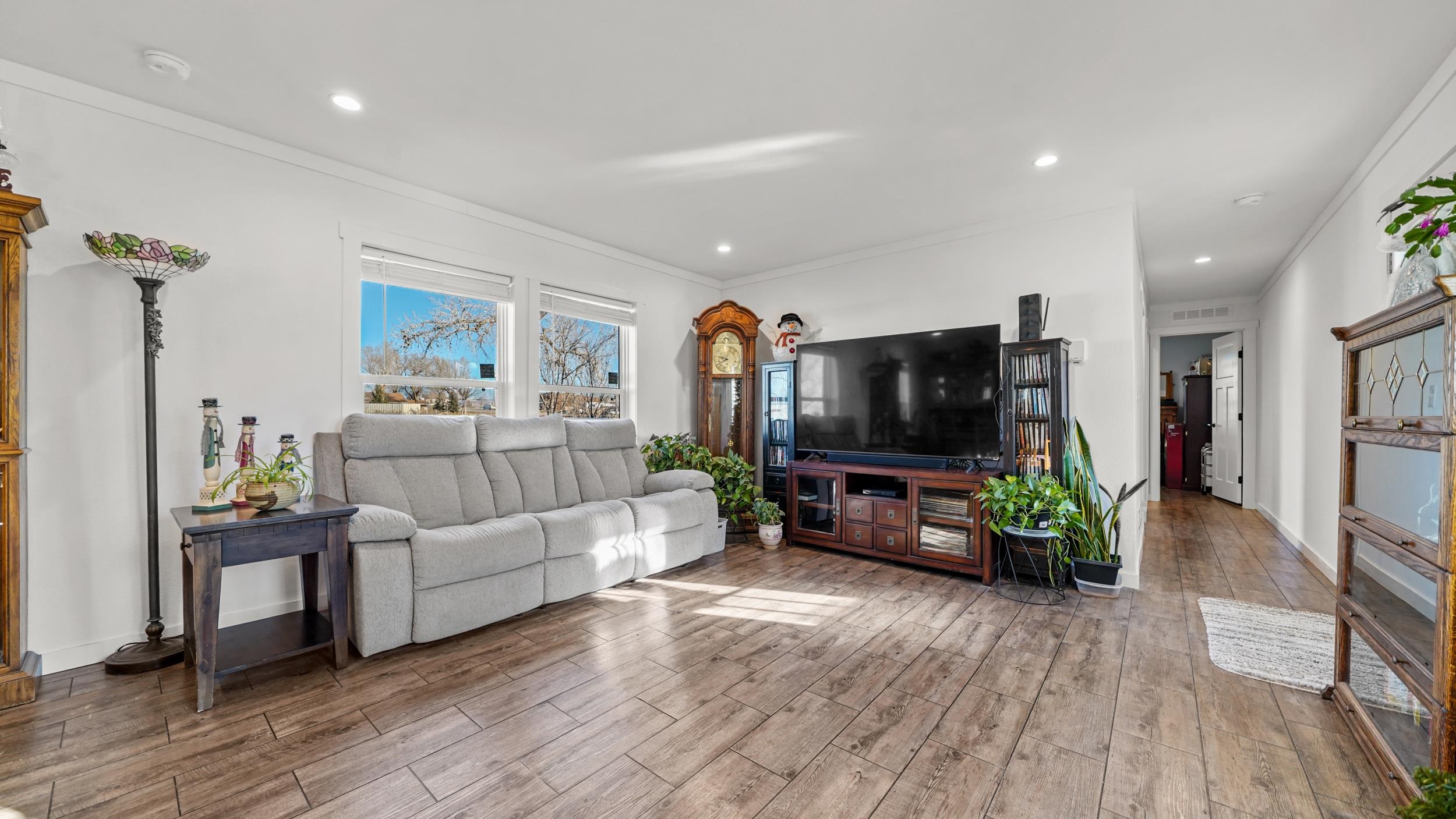 1296 M M 1/4 Road Loma, CO 81524 - Photo 7 of 30 a living room with furniture and a flat screen tv
