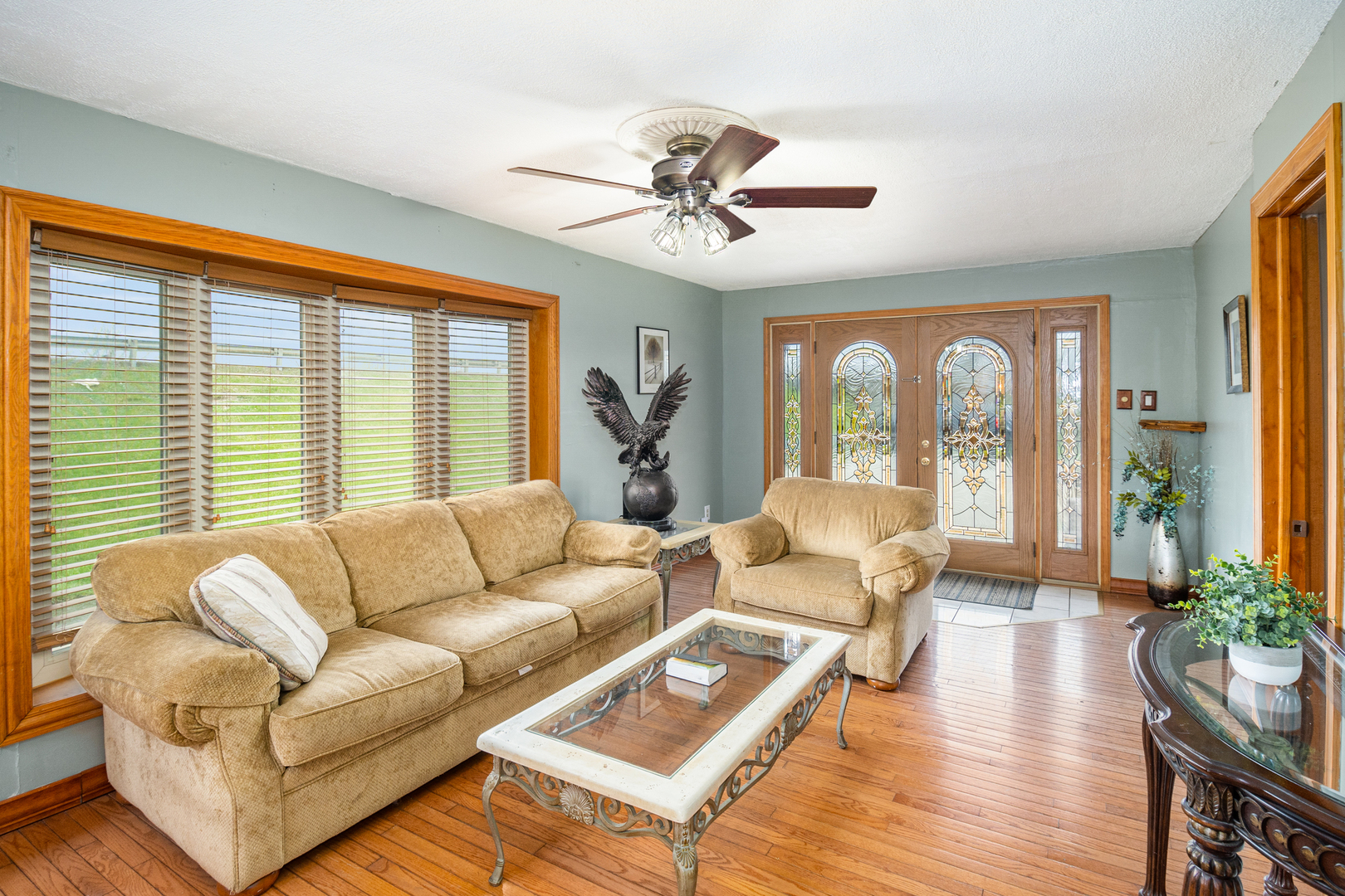 818 Clinton Street Lockport, IL 60441 - Photo 2 of 23 a living room with furniture and a large window