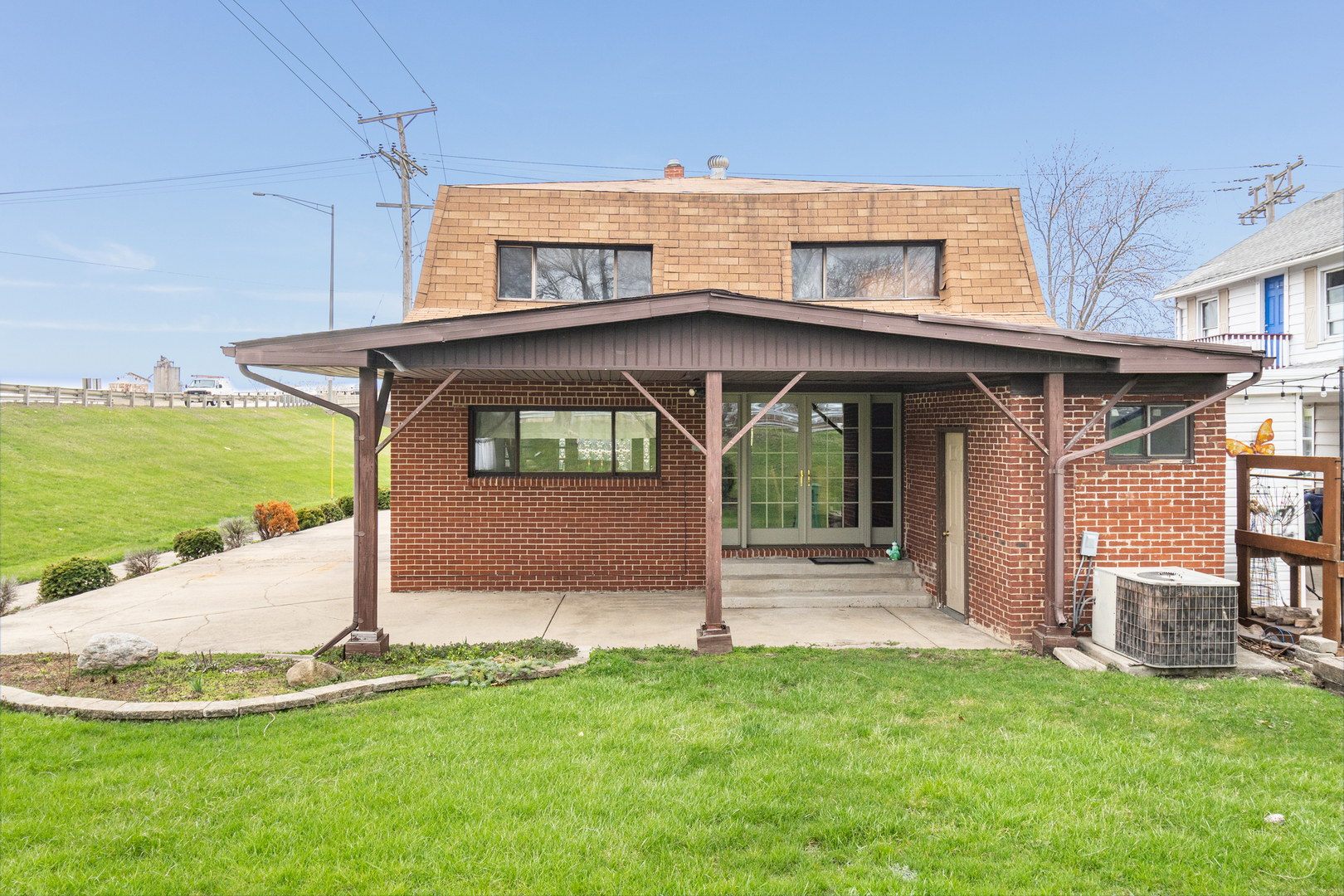 818 Clinton Street Lockport, IL 60441 - Photo 23 of 23 a front view of house with yard
