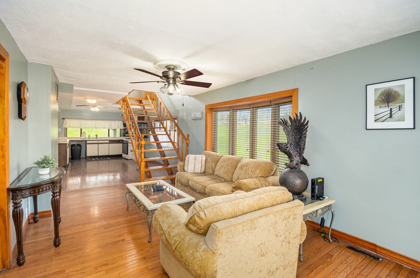 818 Clinton Street Lockport, IL 60441 - Photo 3 of 23 a living room with furniture and a wooden floor