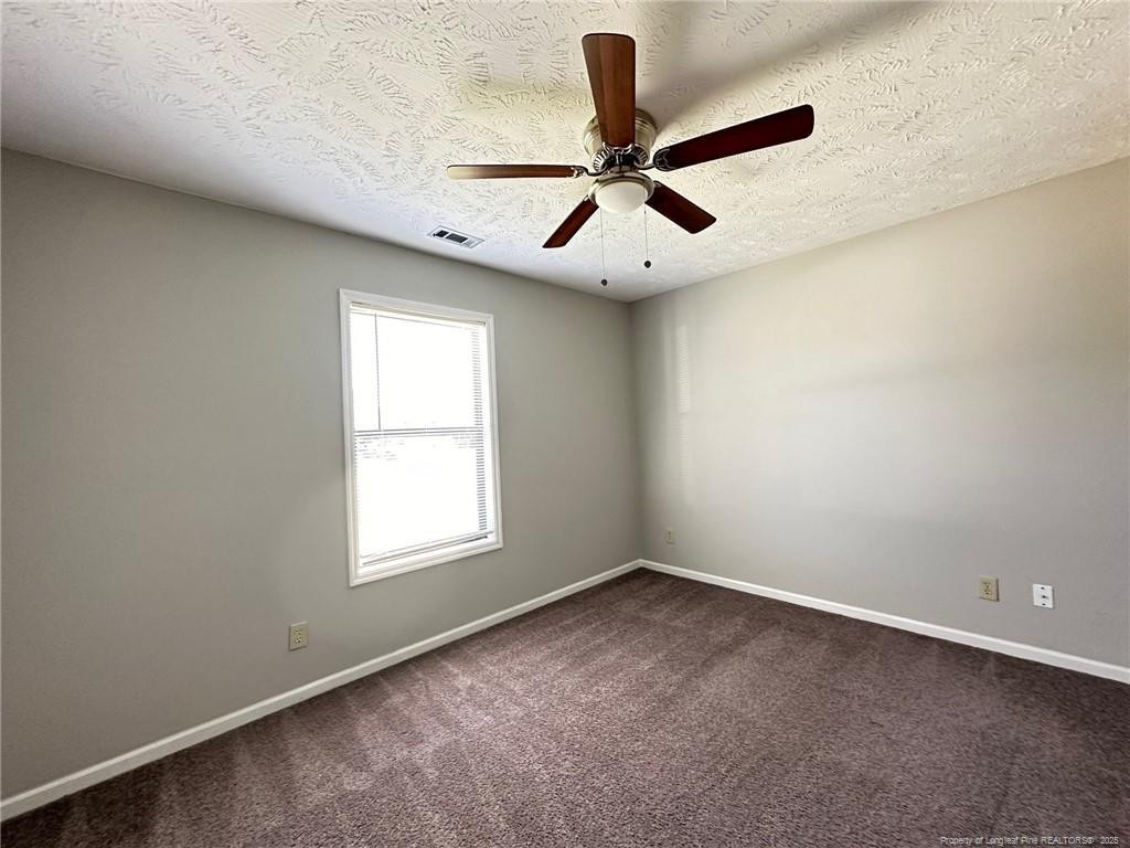 166 Eulon Loop, Unit B Raeford, NC 28376 - Photo 13 of 16 Bedroom One