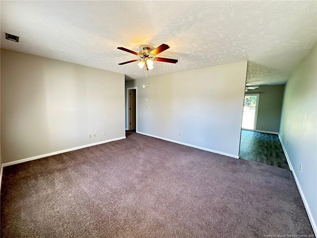 166 Eulon Loop, Unit B Raeford, NC 28376 - Photo 6 of 16 Living Room open to Kitchen