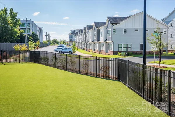 a view of an apartment with a garden and plants