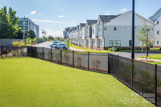 a view of an apartment with a garden and plants