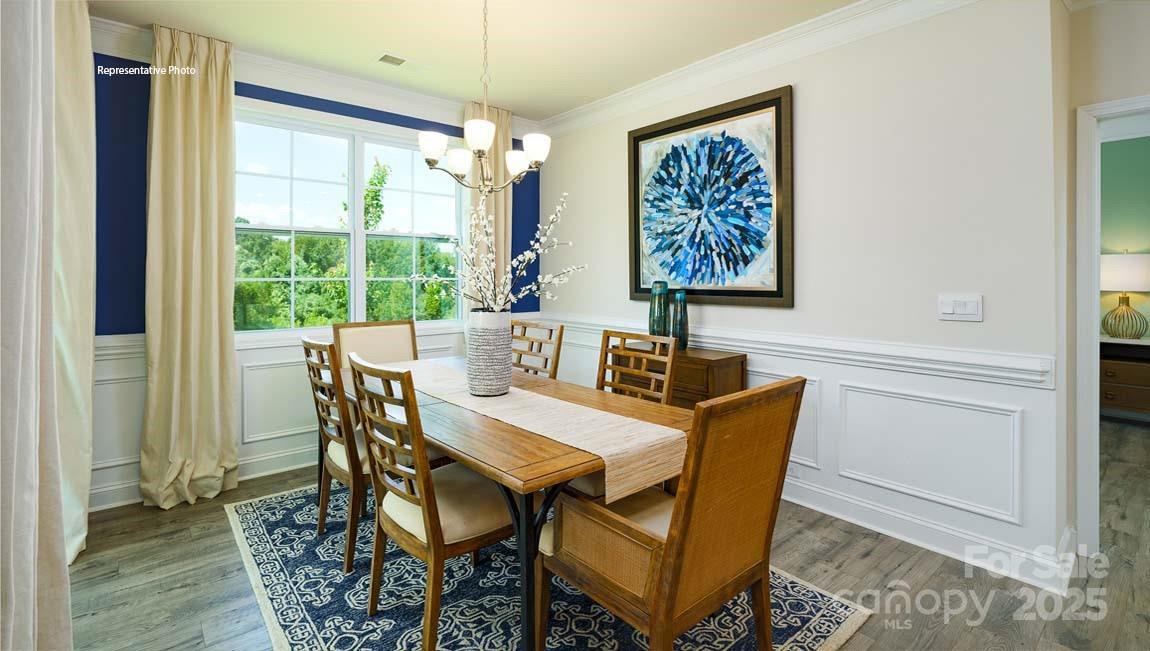 7641 Bainbridge Road Sherrills Ford, NC 28673 - Photo 13 of 29 a view of a dining room with furniture window and outside view